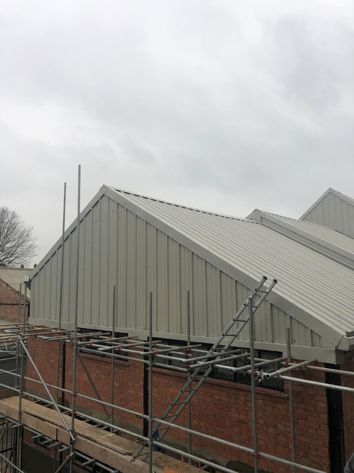 Professional metal roofing installation project in North London by BLT Building Contractors