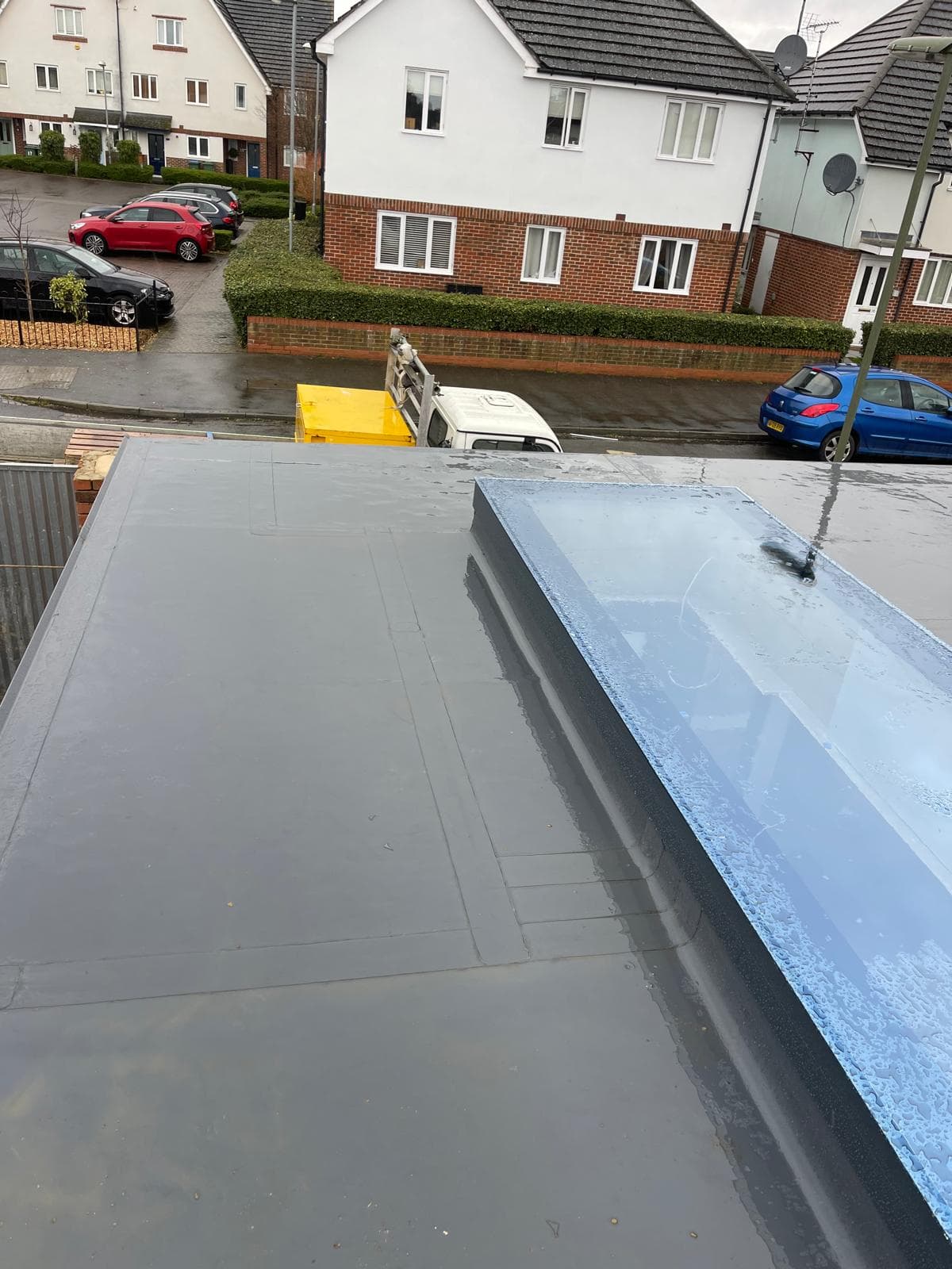 Multi-level flat roof installation with waterproof membrane by BLT Building Contractors